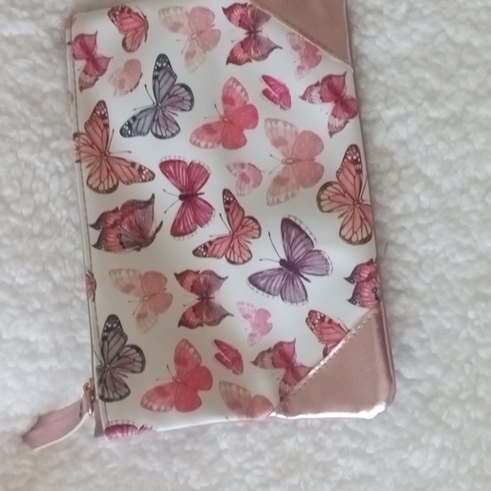 Ipsy pink faux leather with butterflies
